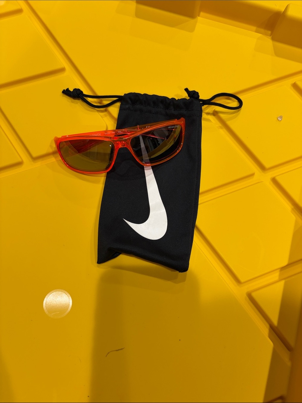 Nike Kids Clear Orange Frame Sunglasses with Black Logo Pouch